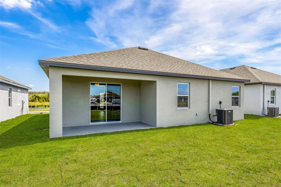 Exterior details and patio area of a home in Gum Lake Preserve, Lake Alfred (Image 1).
