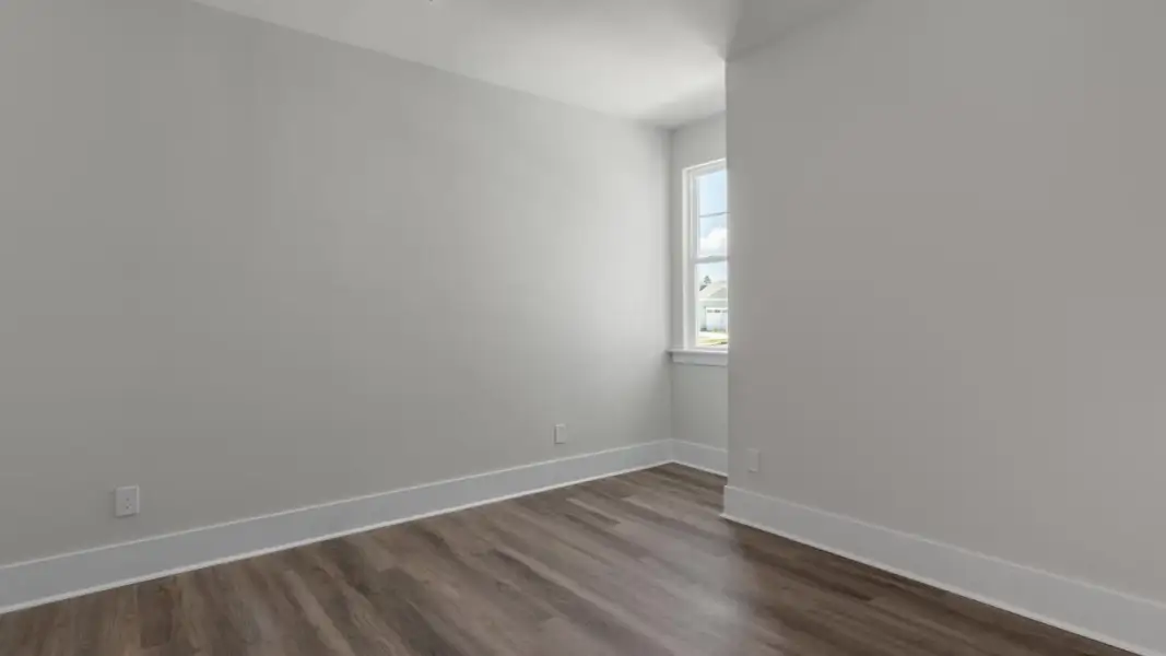 Spacious, unfurnished interior of a new home in The Retreat at Indigo Preserve Townhomes, Leland (Image 27).