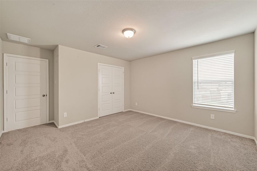 Spacious, unfurnished interior of a new home in Sunterra, Katy (Image 25).