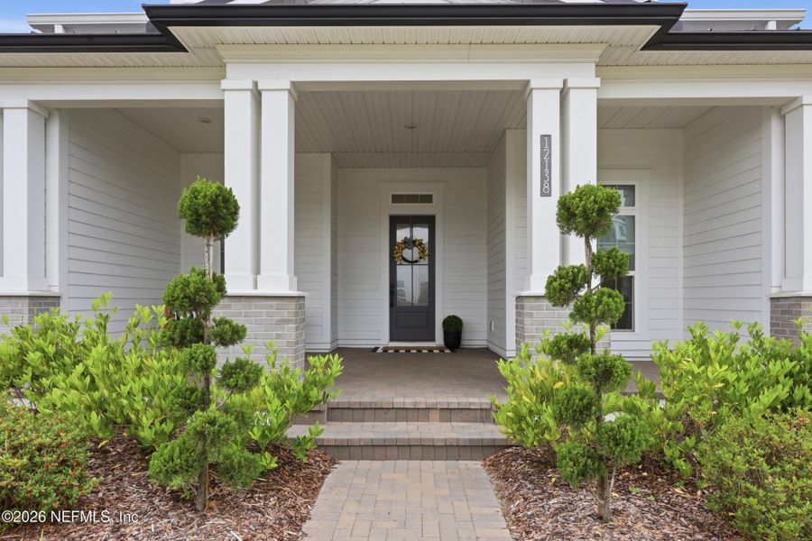 Exterior details and patio area of a home in Seven Pines 70' Rear Entry, Jacksonville (Image 36).