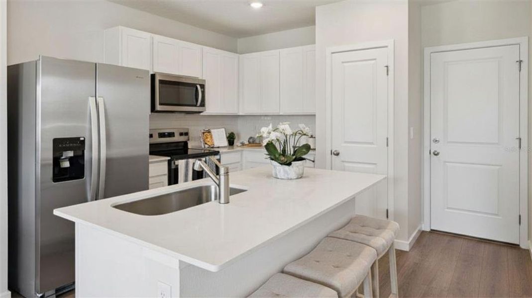 Furnished interior view inside a new home in Fish Lake Cove, Kissimmee (Image 10).