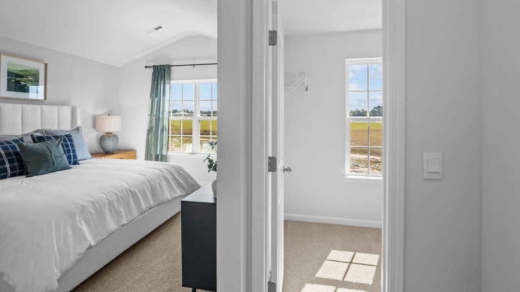 Furnished interior view inside a new home in The Townes at Ridgewood Farms, Winterville (Image 16). Furnished interior view inside a new home in The Townes at Ridgewood Farms, Winterville (Image 16).