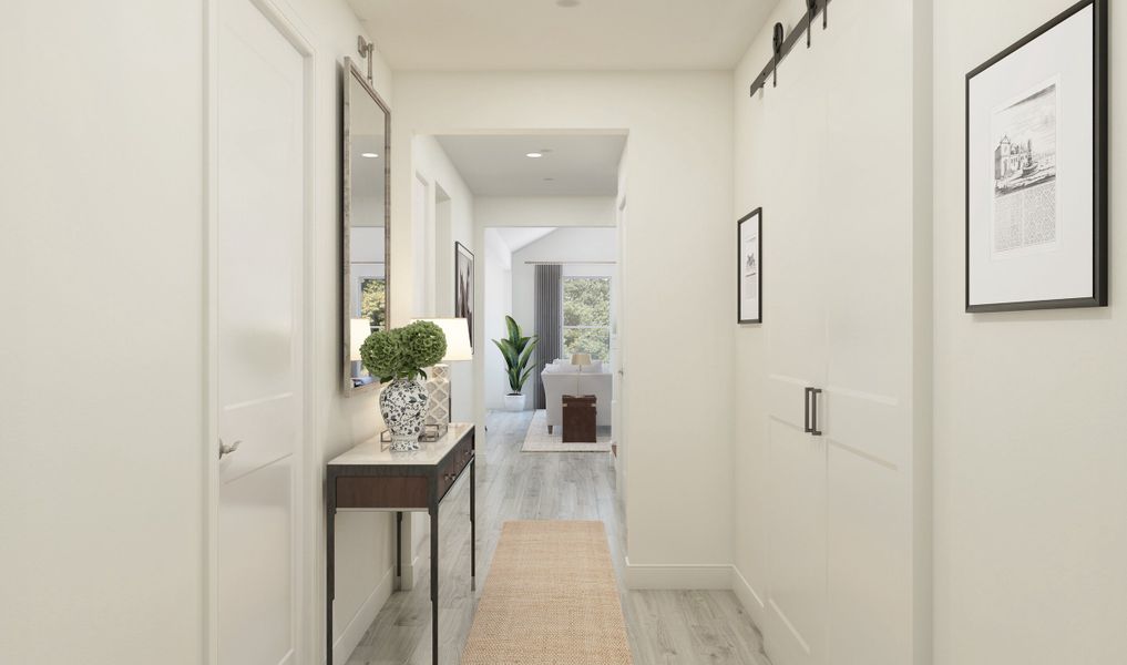 Foyer with home office featuring double barn doors