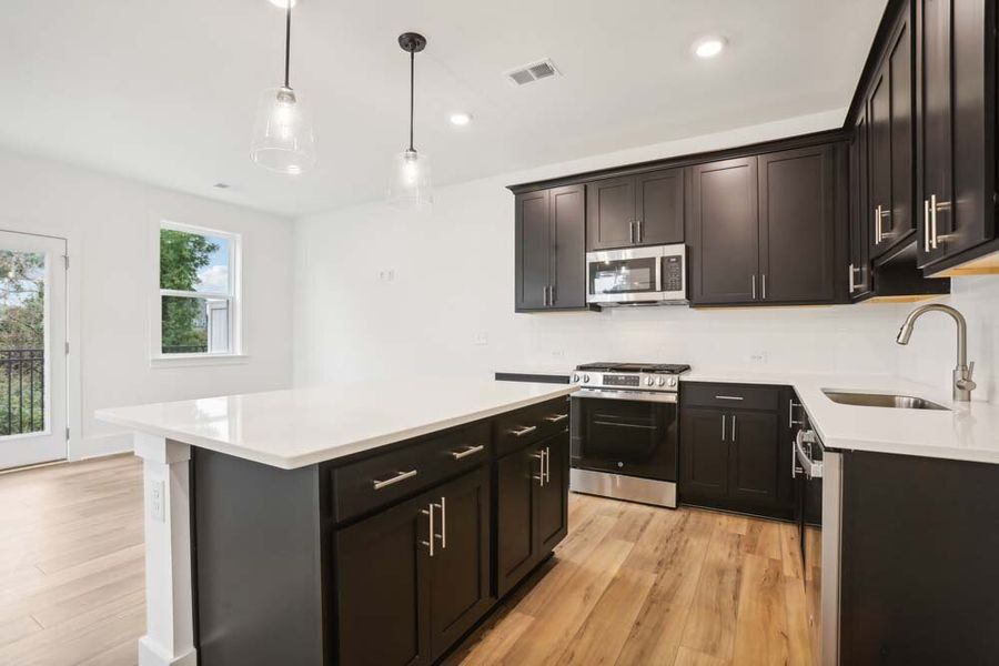 Kitchen Featuring Industrial Collection Finishes