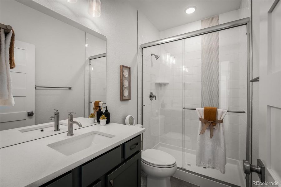 Furnished interior view inside a new home in Cloverleaf - Pinnacle Collection, Monument (Image 15).