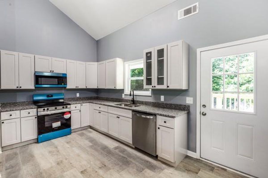 Furnished interior view inside a new home in , Carrollton (Image 5).