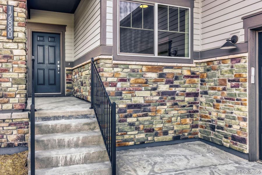 Exterior details and patio area of a home in Knolls, Westminster (Image 22).