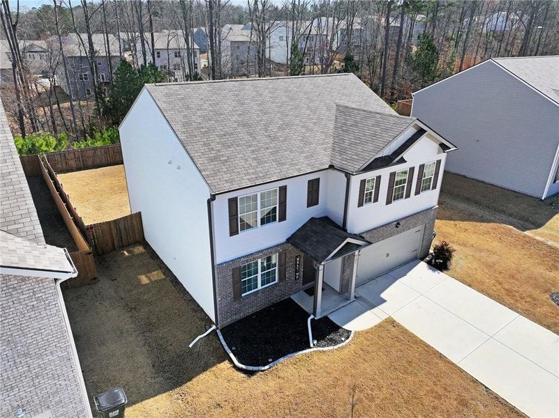 Front exterior of a new home in , Dallas, GA, highlighting curb appeal (Image 31). Front exterior of a new home in , Dallas, GA, highlighting curb appeal (Image 31).