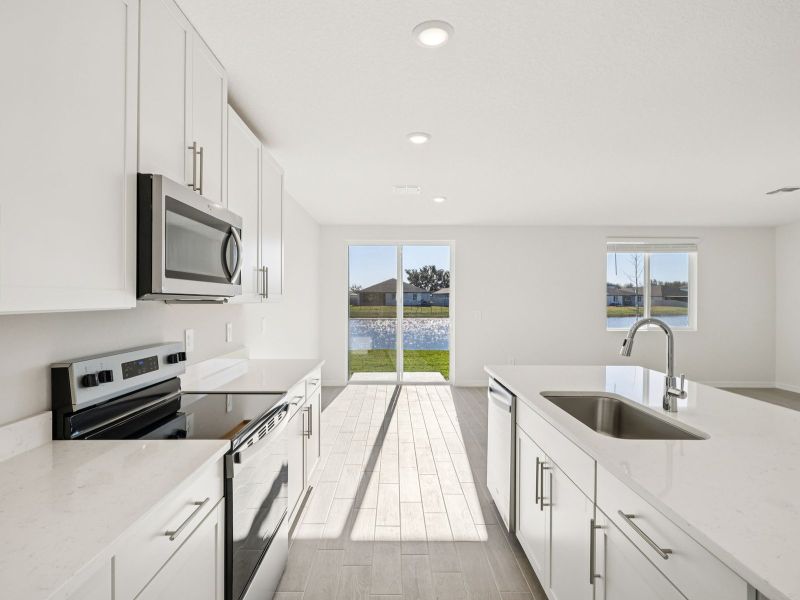 Furnished interior view inside a new home in Oakfield Trails - Classic Series, Parrish (Image 5).