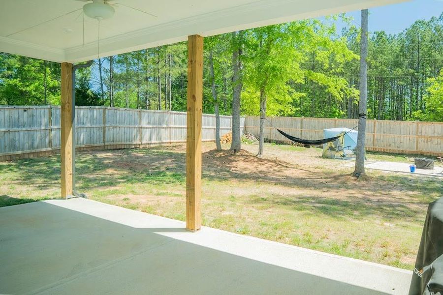 Exterior details and patio area of a home in Park at Ansleigh Farms, Dallas (Image 30).