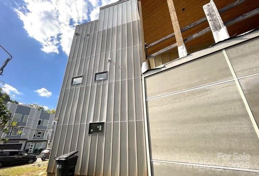 Exterior details and patio area of a home in , Charlotte (Image 8). Exterior details and patio area of a home in , Charlotte (Image 8).