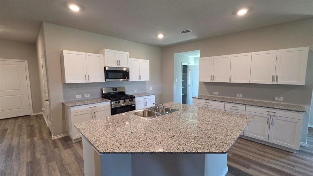 Kitchen - All Home and community information, including pricing, included features, terms, availability and amenities, are subject to change at any time without notice or obligation. All Drawings, pictures, photographs, video, square footages, floor plans, elevations, features, colors and sizes are approximate for illustration purposes only and will vary from the homes as built. Kitchen - All Home and community information, including pricing, included features, terms, availability and amenities, are subject to change at any time without notice or obligation. All Drawings, pictures, photographs, video, square footages, floor plans, elevations, features, colors and sizes are approximate for illustration purposes only and will vary from the homes as built.