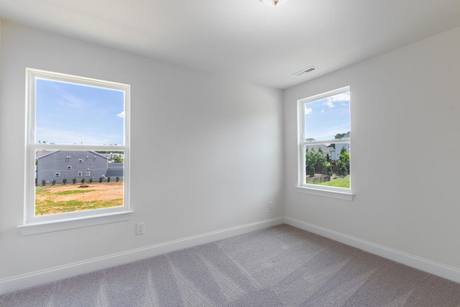 Spacious, unfurnished interior of a new home in Enclave at Traditions Townhomes, Wake Forest (Image 23).