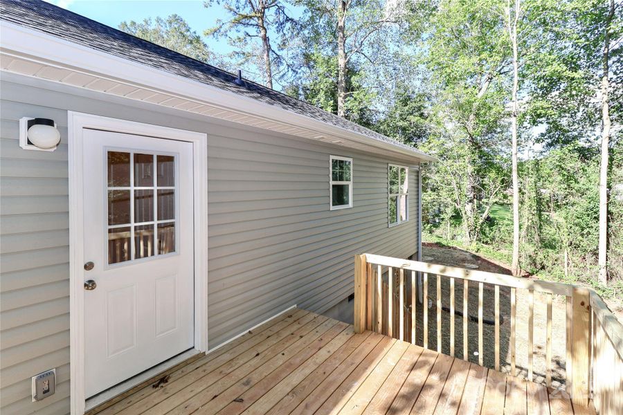 Front exterior of a new home in , Statesville, NC, highlighting curb appeal (Image 15).
