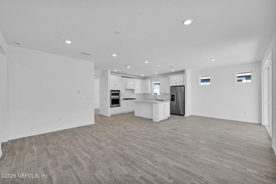 Spacious, unfurnished interior of a new home in Del Webb Wildlight, Yulee (Image 14).