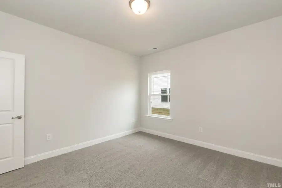 Spacious, unfurnished interior of a new home in East Lake, Leland (Image 20).