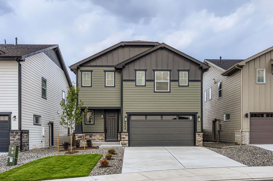 Front exterior of a new home in Sterling Ranch 40s, Colorado Springs, CO, highlighting curb appeal (Image 1).