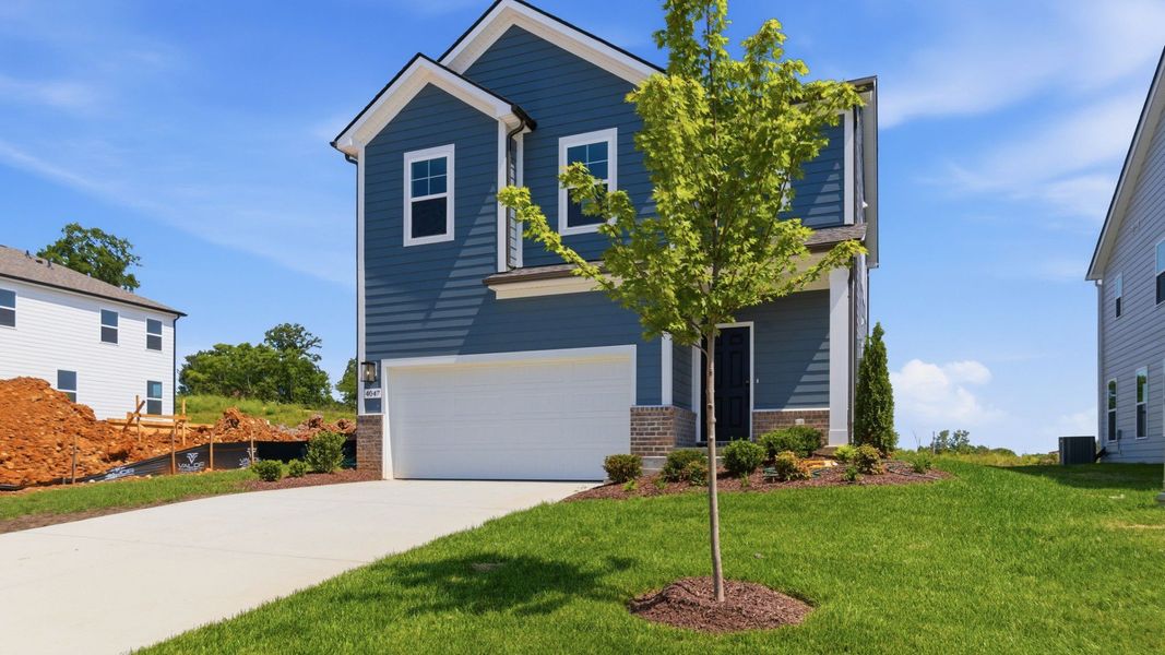 Exterior with 2-car garage