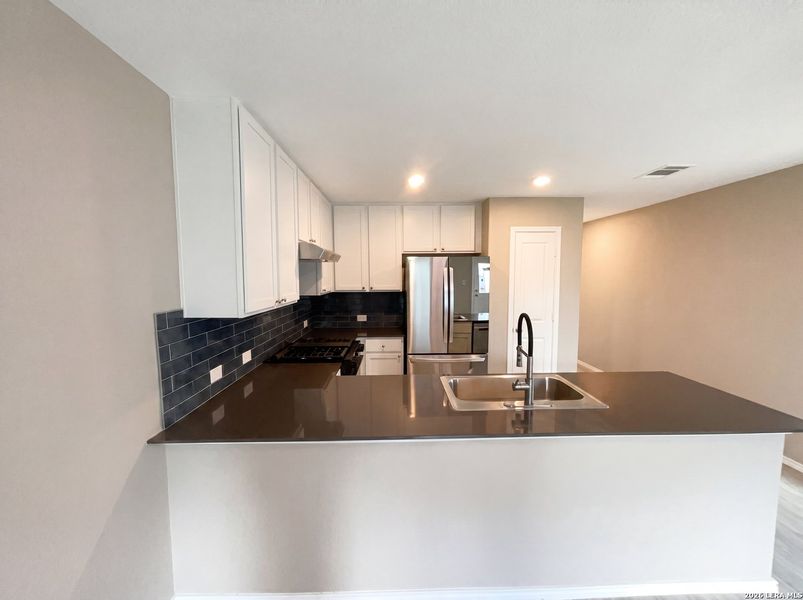 Furnished interior view inside a new home in Aston Park, San Antonio (Image 5).