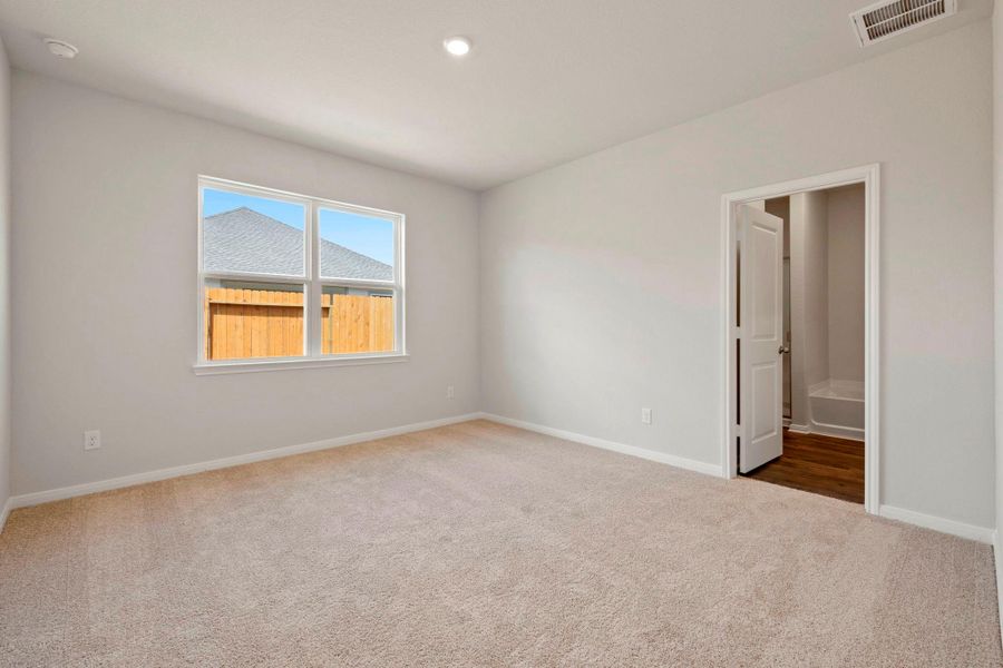 Spacious, unfurnished interior of a new home in Vacek Country Meadows, Richmond (Image 14).