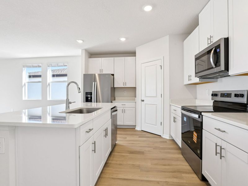 Furnished interior view inside a new home in Benton Hills - Classic Series, Brooksville (Image 6). Furnished interior view inside a new home in Benton Hills - Classic Series, Brooksville (Image 6).