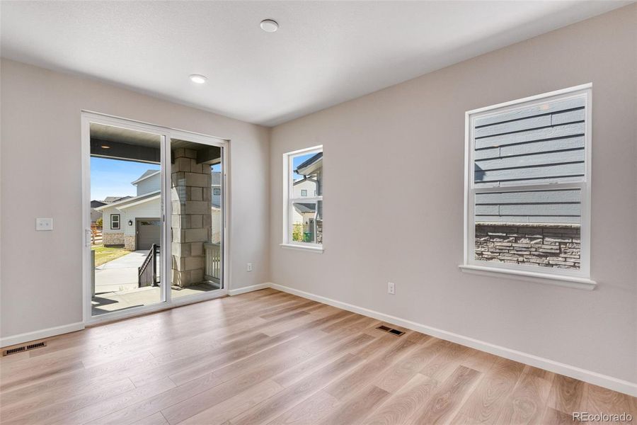 Spacious, unfurnished interior of a new home in Crescendo at The Aurora Highlands, Aurora (Image 30).