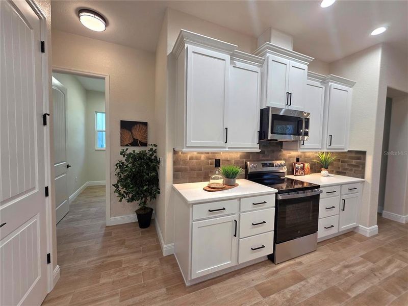 Furnished interior view inside a new home in , Brooksville (Image 32).