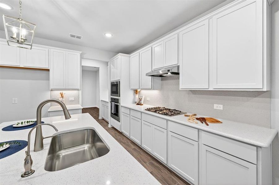 Furnished interior view inside a new home in Lily Creek at Sutton Fields, Aubrey (Image 6).