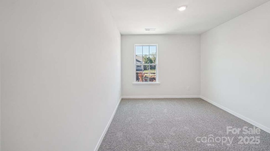 Spacious, unfurnished interior of a new home in Cardinal Creek, Charlotte (Image 13).