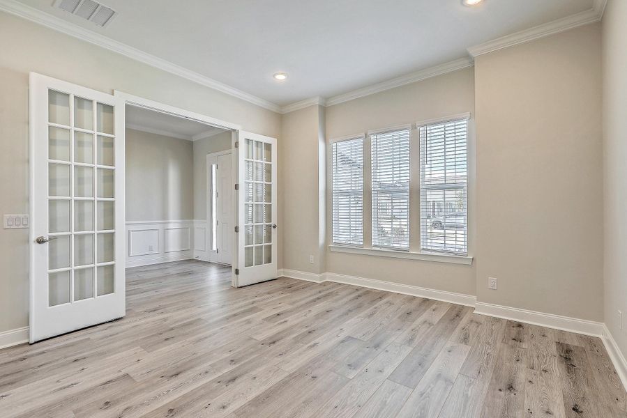 Spacious, unfurnished interior of a new home in K. Hovnanian's® Four Seasons at Lakes of Cane Bay, Summerville (Image 29).