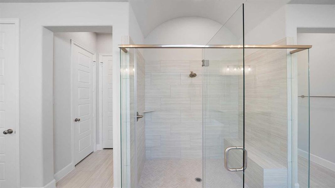 Bathroom with a shower with shower door