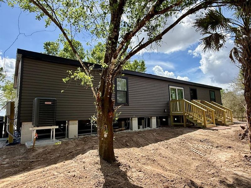 Exterior details and patio area of a home in , Okeechobee (Image 3).