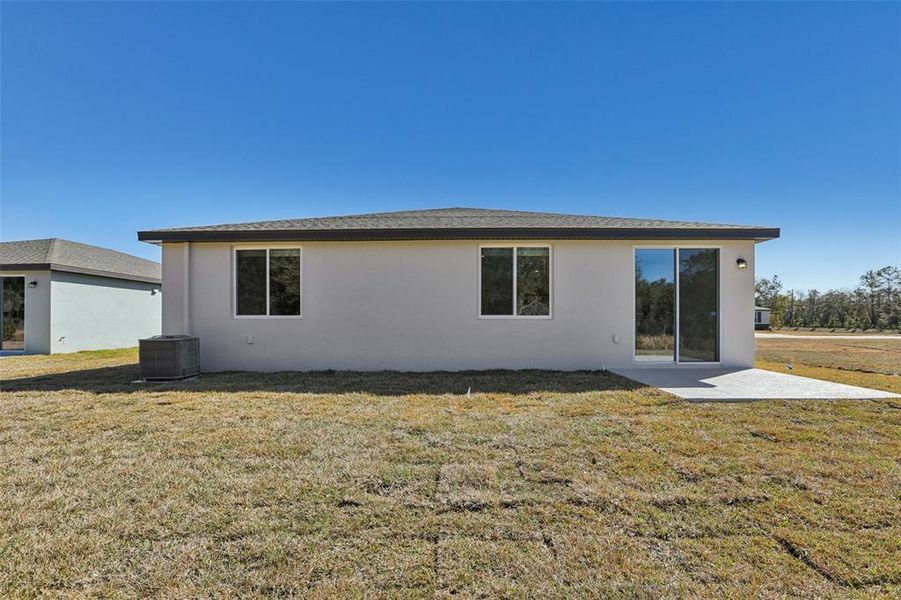 Exterior details and patio area of a home in Leyland Preserve - Classic Series, Brooksville (Image 22).