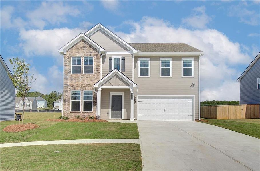 Front exterior of a new home in Chapel Hill, Newnan, GA, highlighting curb appeal (Image 2). Front exterior of a new home in Chapel Hill, Newnan, GA, highlighting curb appeal (Image 2).