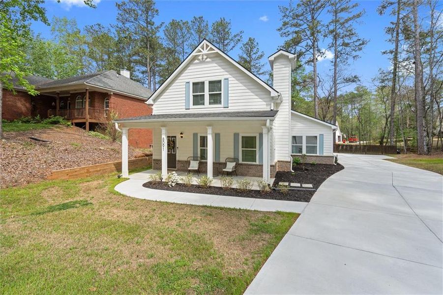 Front exterior of a new home in Fairfield Plantation, Villa Rica, GA, highlighting curb appeal (Image 26).