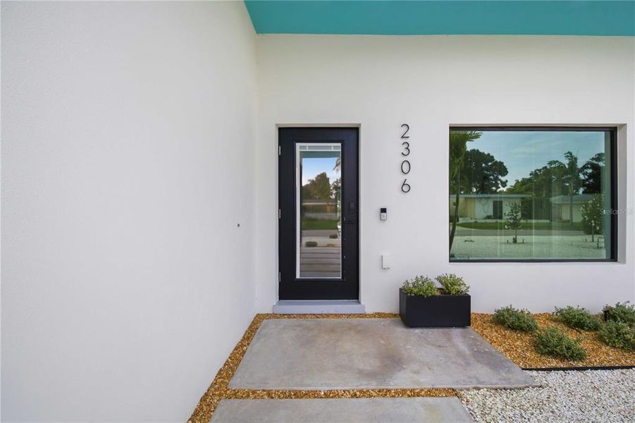 Exterior details and patio area of a home in , Sarasota (Image 20).
