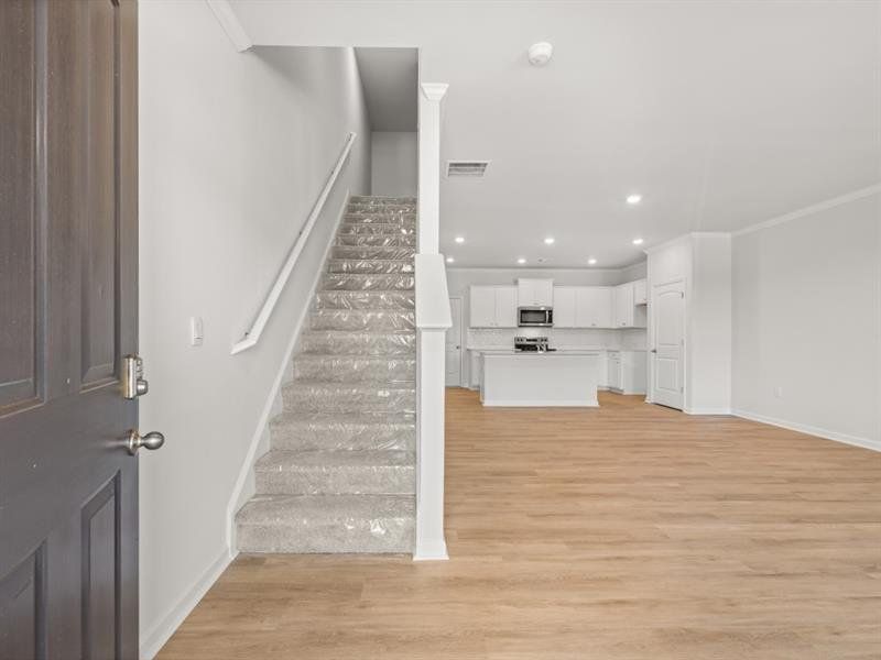 Spacious, unfurnished interior of a new home in Waypoint, Flowery Branch (Image 14).