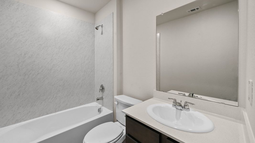 Furnished interior view inside a new home in Crane Crossing, Crandall (Image 12).