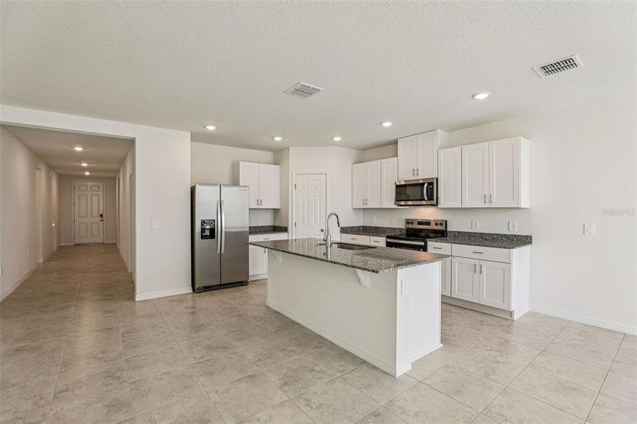 Furnished interior view inside a new home in Lawson Dunes - Signature Series, Haines City (Image 15). Furnished interior view inside a new home in Lawson Dunes - Signature Series, Haines City (Image 15).