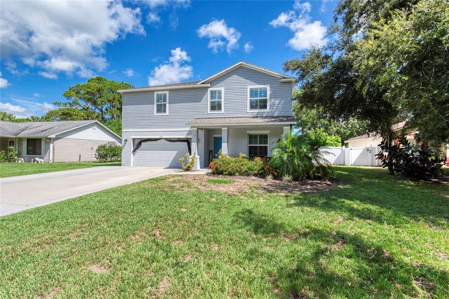 Front exterior of a new home in , Port Orange, FL, highlighting curb appeal (Image 22).