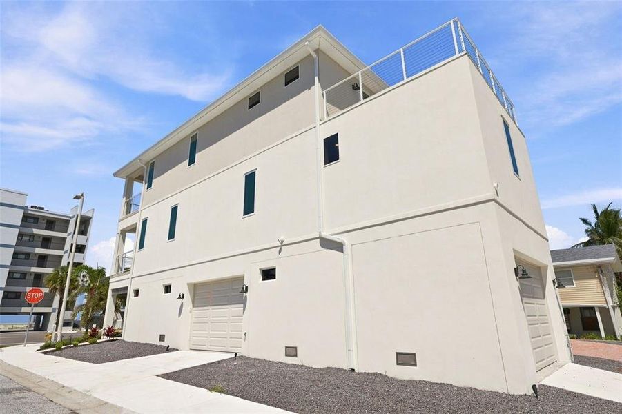 Front exterior of a new home in , Indian Rocks Beach, FL, highlighting curb appeal (Image 2). Front exterior of a new home in , Indian Rocks Beach, FL, highlighting curb appeal (Image 2).