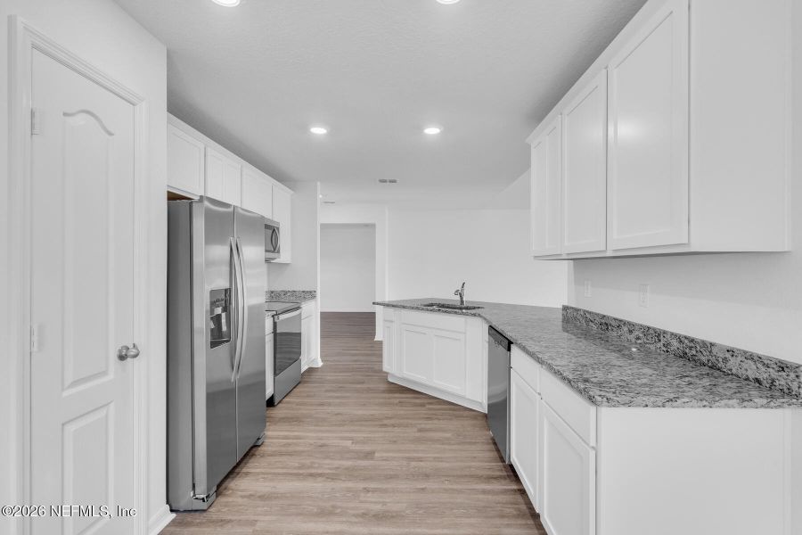 Furnished interior view inside a new home in Rolling Hills, Green Cove Springs (Image 6).