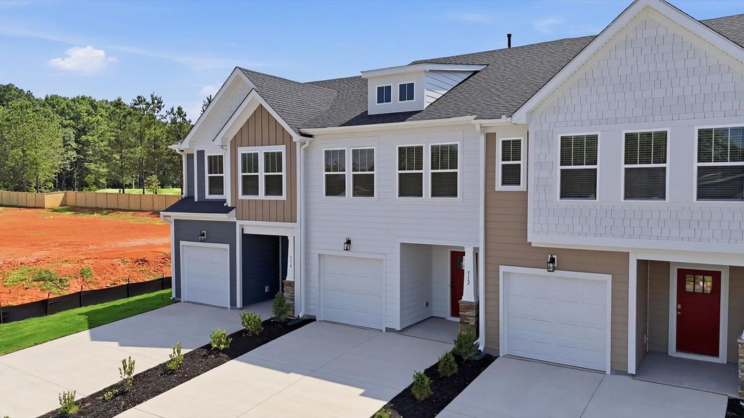 Refined exterior design with balanced architectural detail in this distinguished two-story villa at Barton Hollow Refined exterior design with balanced architectural detail in this distinguished two-story villa at Barton Hollow