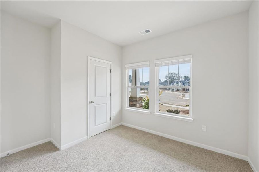 Spacious, unfurnished interior of a new home in Westmont Preserve, Powder Springs (Image 48).