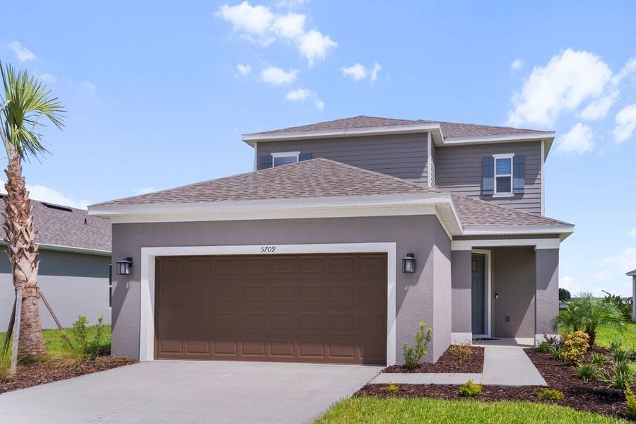 Representative exterior photo of a completed home built from the Captiva by Taylor Morrison in Cassia at Skye Ranch, Sarasota, FL (Image 18).