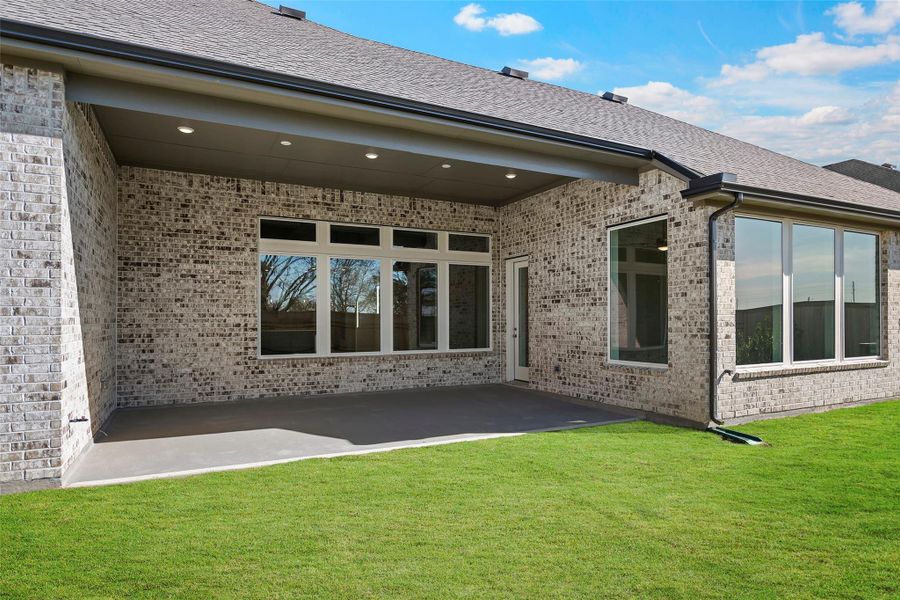 Exterior details and patio area of a home in Bridgeland, Cypress (Image 23). Exterior details and patio area of a home in Bridgeland, Cypress (Image 23).