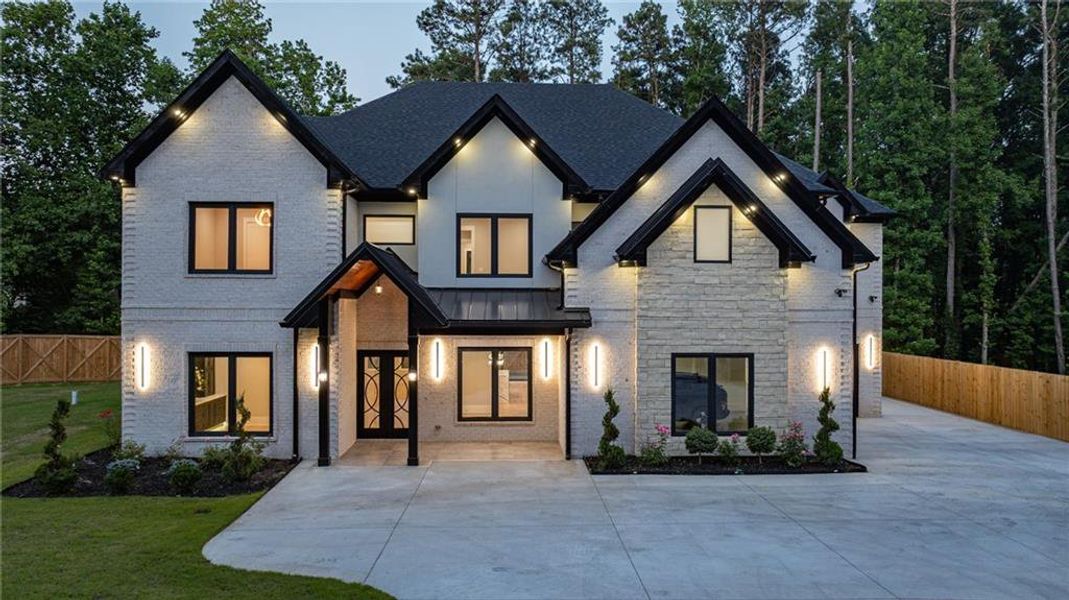 Front exterior of a new home in , Lawrenceville, GA, highlighting curb appeal (Image 28). Front exterior of a new home in , Lawrenceville, GA, highlighting curb appeal (Image 28).