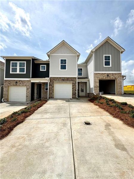 Front exterior of a new home in Stegall Village, Cartersville, GA, highlighting curb appeal (Image 79).