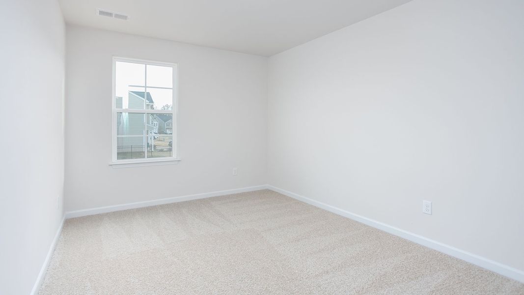 Spacious, unfurnished interior of a new home in Chandler Pointe, Rural Hall (Image 14).