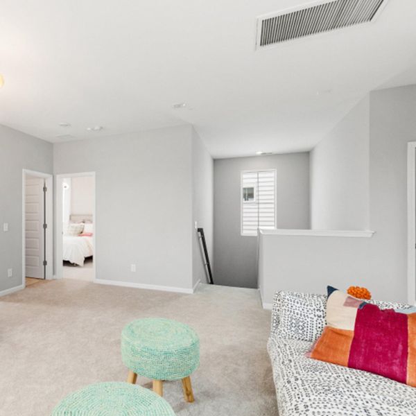 Furnished interior view inside a new home in Sweetgrass at Summers Corner, Summerville (Image 16).